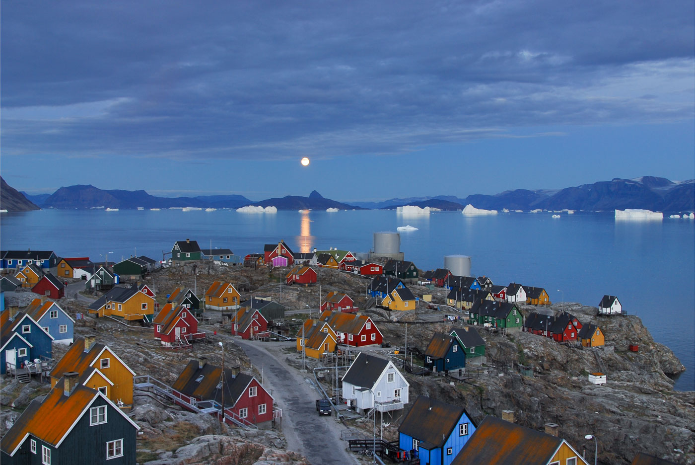 No. 4: Marvel at the moon rising behind the massiv icebergs and listen to the whining Huskies - Uummannaq, Greenland, 2007