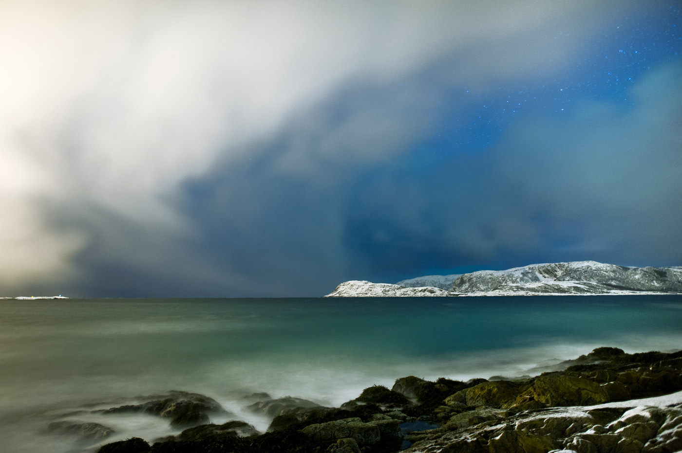 Snowstorm mixing up with Aurora Sunstorm, Sommarøy, 2012
