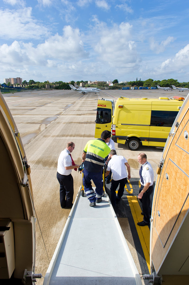 The ground ambulance transports the patient into the aircraft, Palma de Mallorca, Spain, 2012