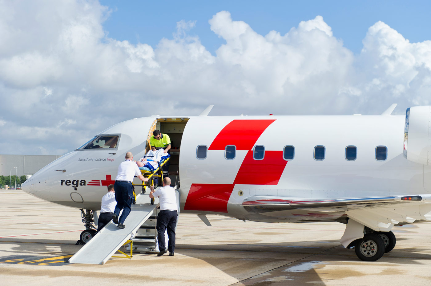 The ground ambulance transports the patient into the aircraft, Palma de Mallorca, Spain, 2012