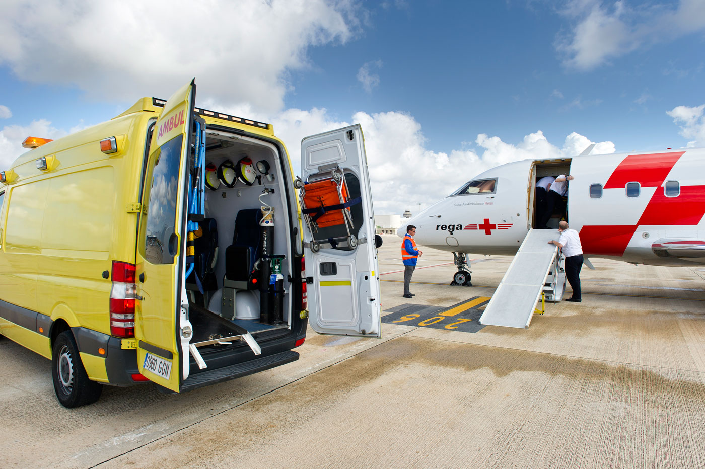 The ground ambulance transports the patient to the waiting aircraft, Palma de Mallorca, Spain, 2012