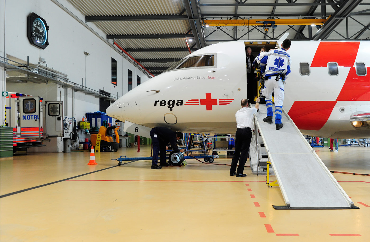 The patient is taken by ambulance to hospital, Rega Headquarters Zurich Airport, 2012